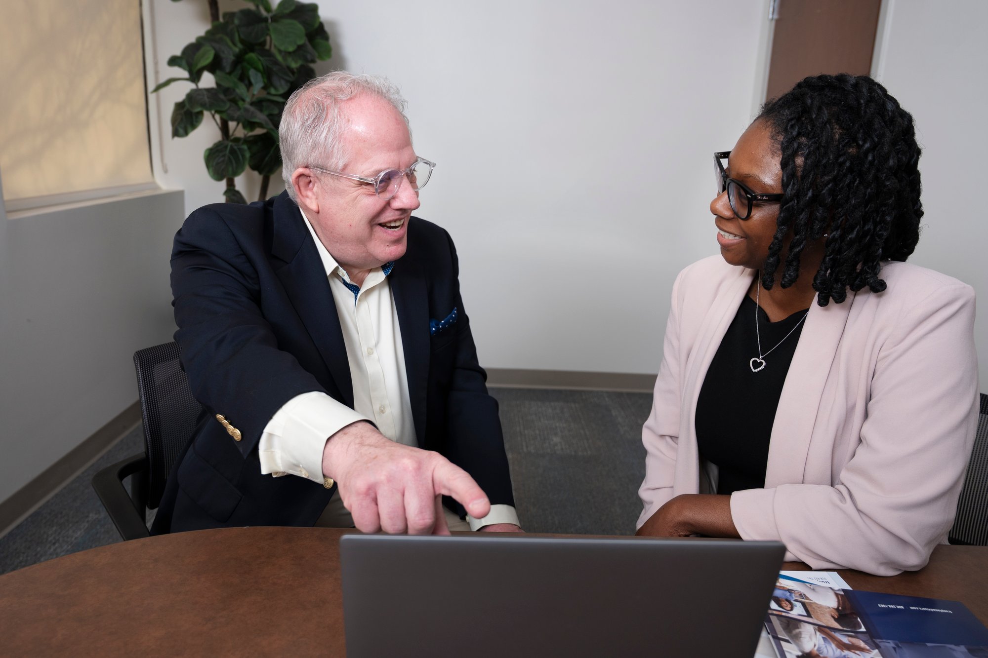 TruePlan's Bernard A. Gleeson and&nbsp;Regine Russell working on benefits management