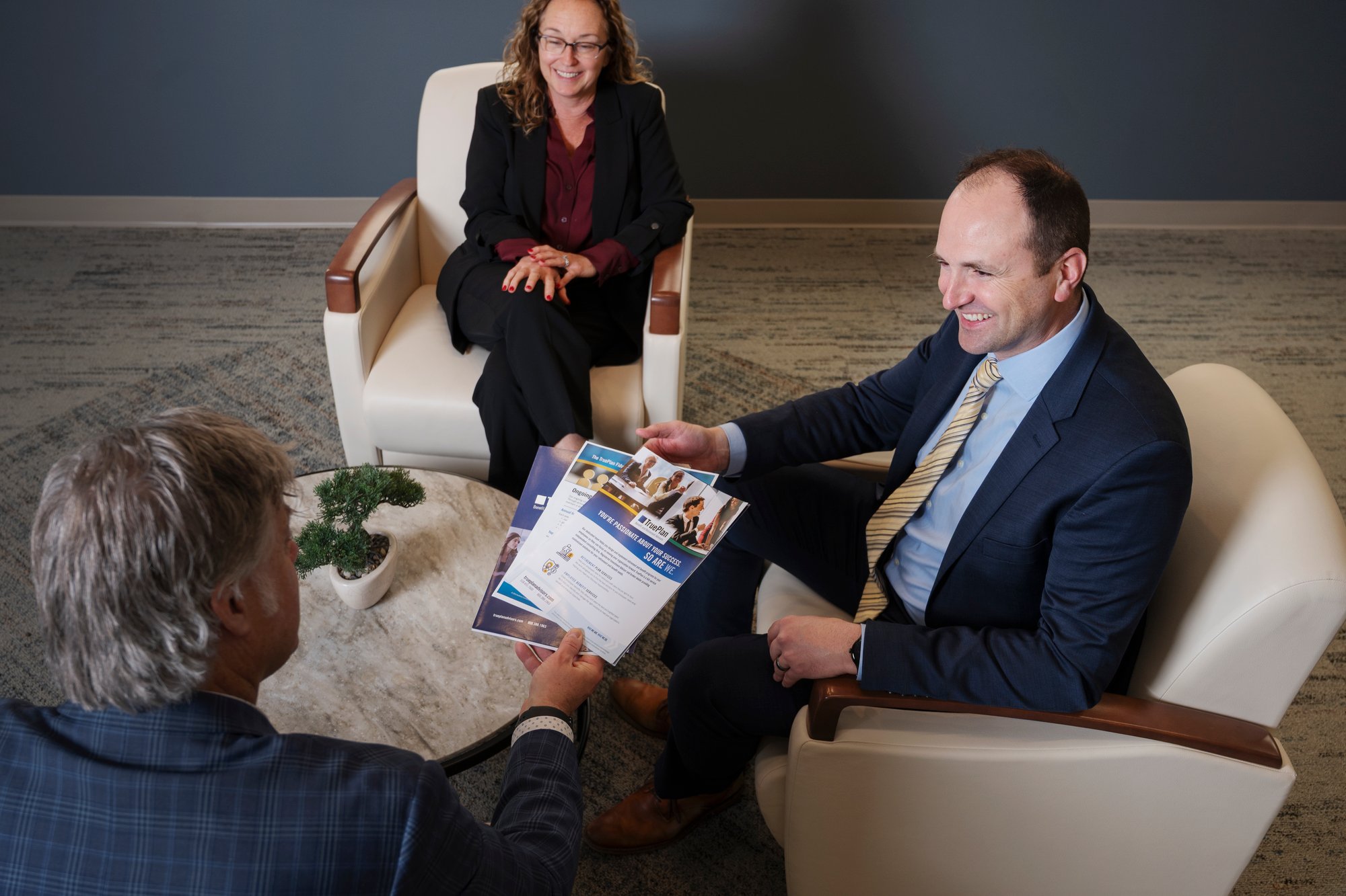 TruePlan Benefit and Retirement Advisors having a casual conversation with a client