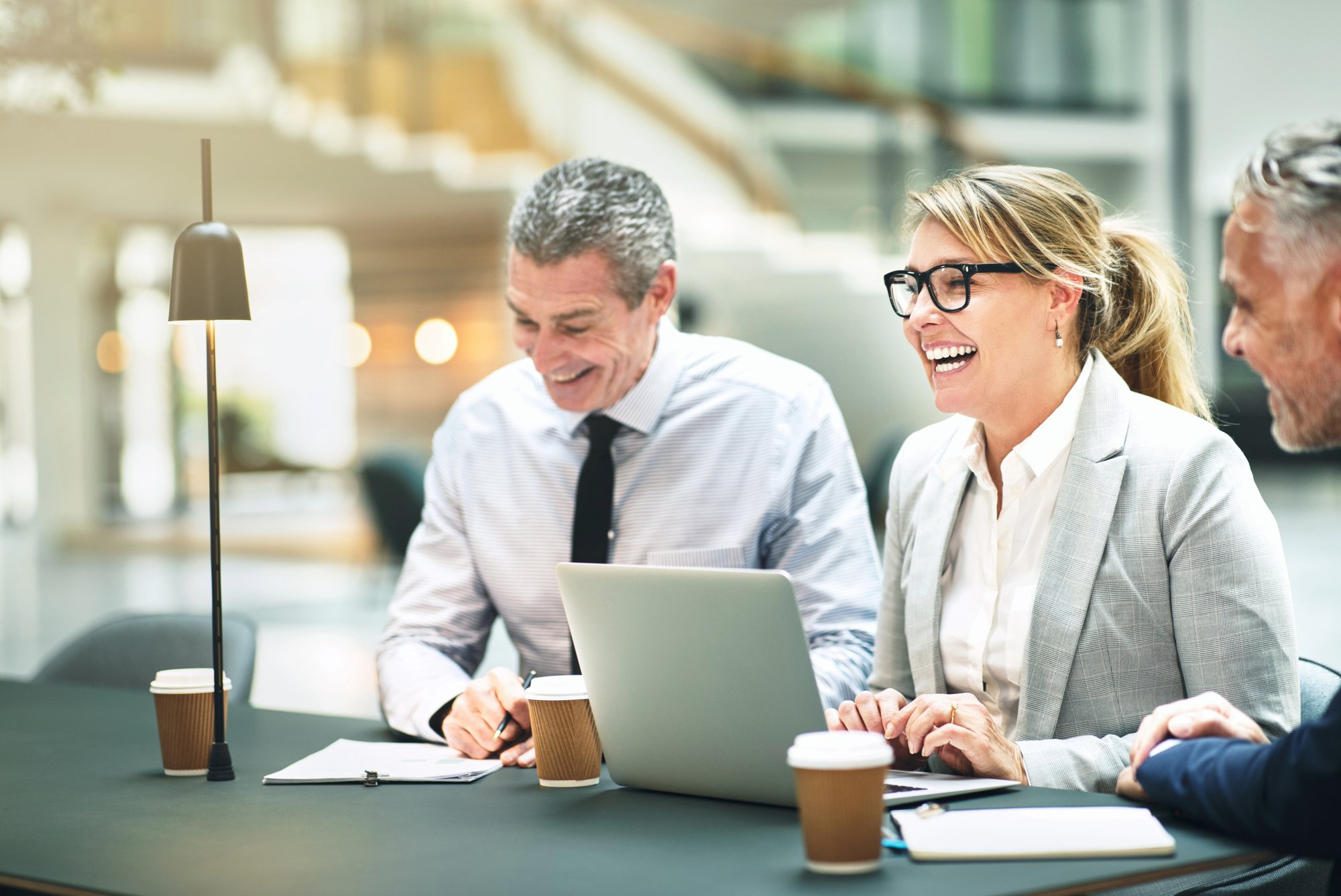 Organization leaders reviewing executive coverage options