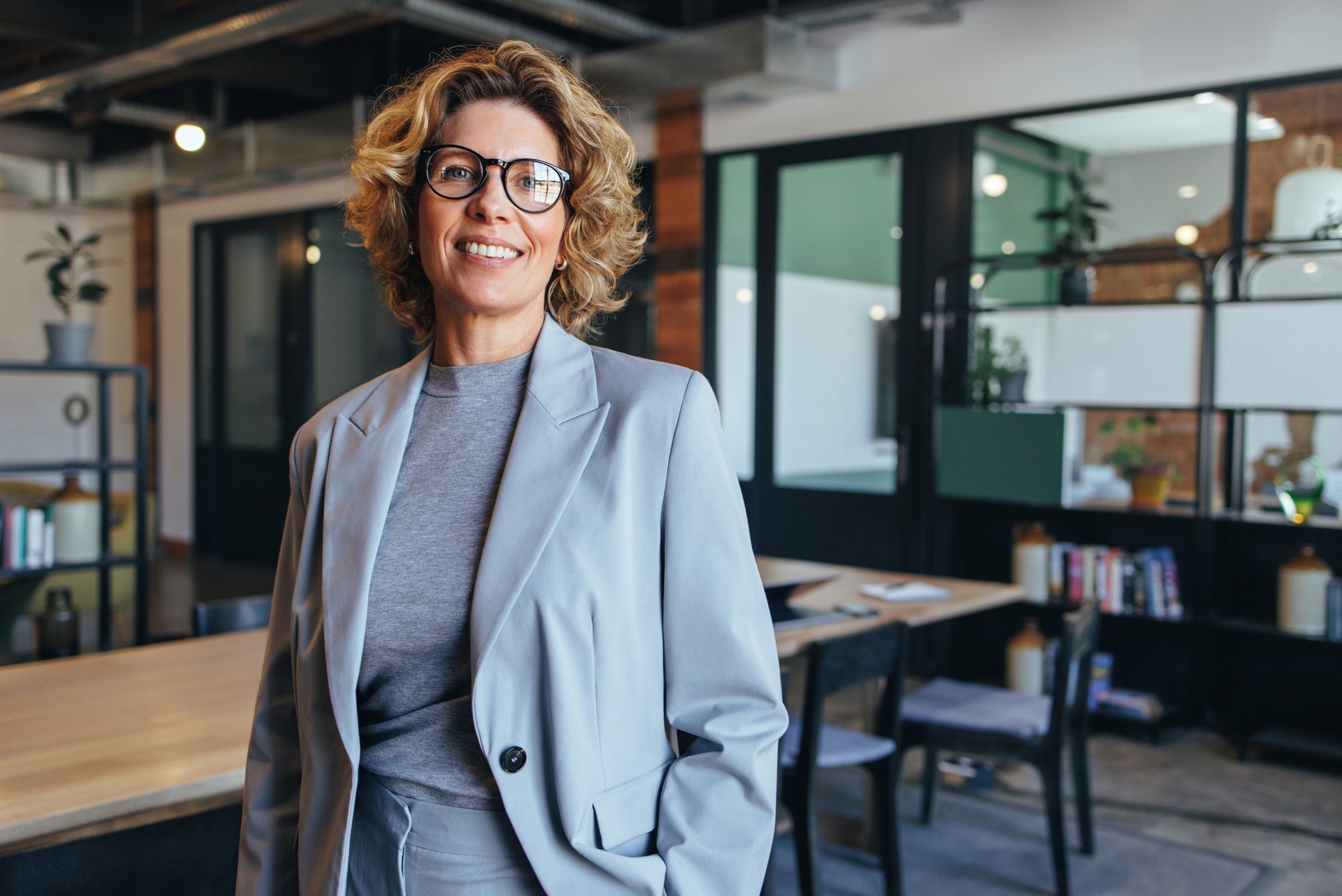 Executive smiling about potential executive disability plan coverage